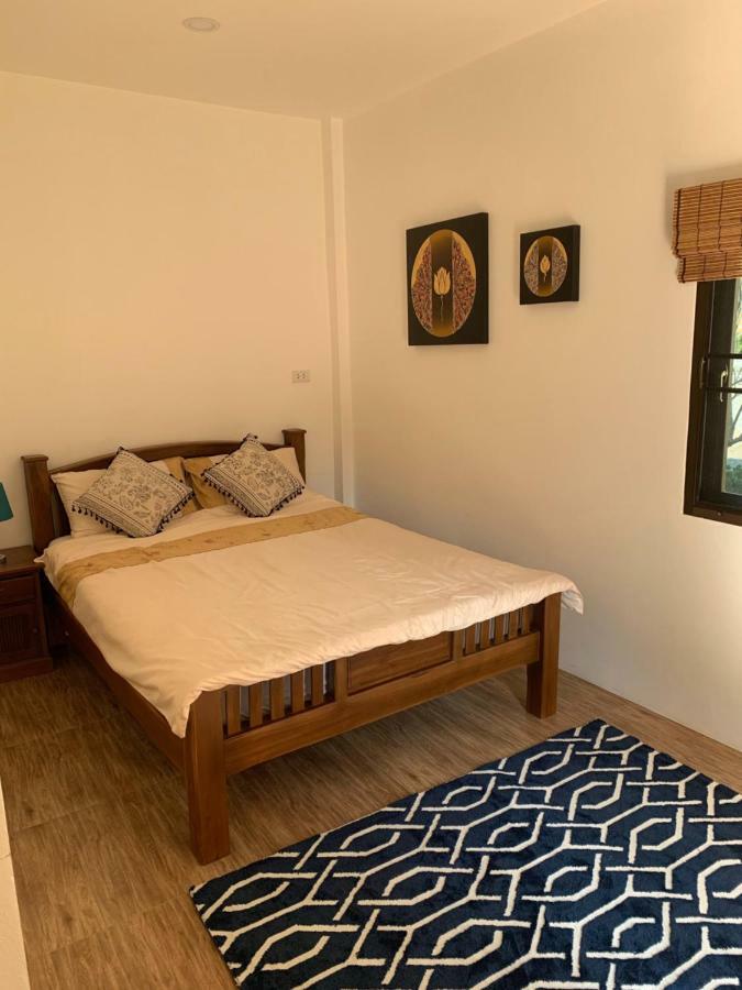 SUNRAY Guesthouse สุนันท์บ้านพักริมคลอง Uthai Thani Eksteriør billede